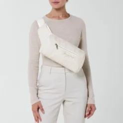 Cybex Coya Bouclé Bärsele - Cream White